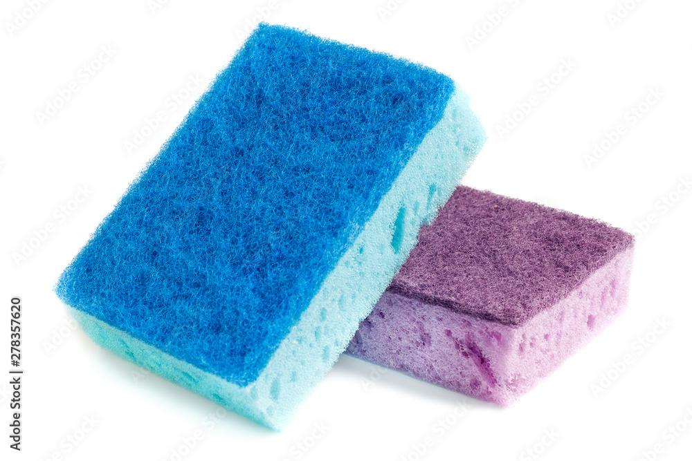 Domestic needs. Blue sponge lies on a purple sponge at a slight angle. isolate