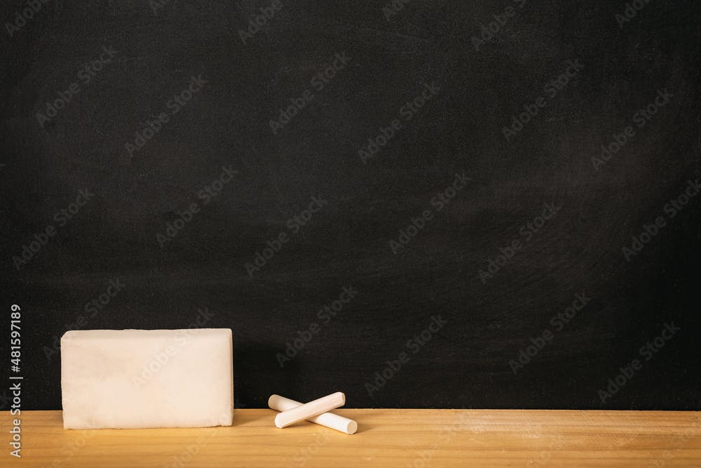 School chalkboard, blank empty black board, sponge and white chalk piece, copy space