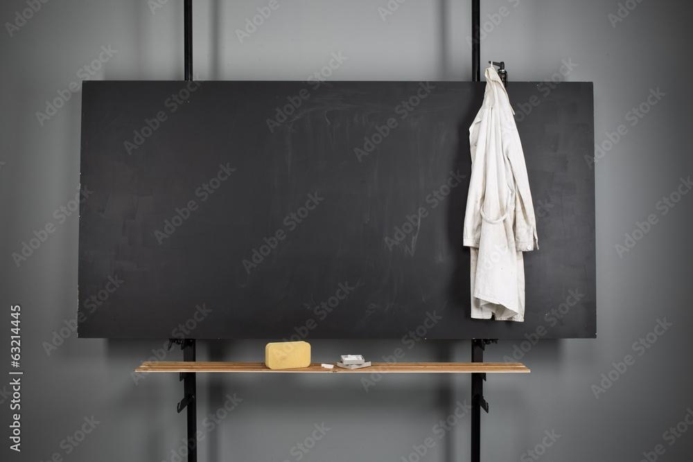 school blackboard with sponge and chalk