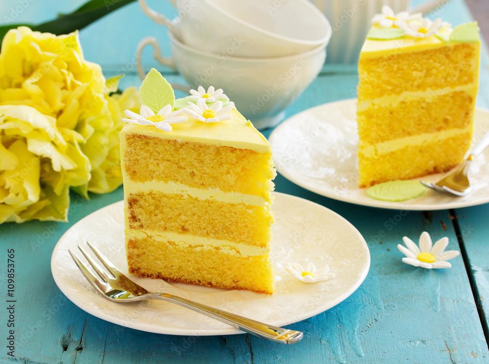 A piece of lemon sponge cake on a plate.