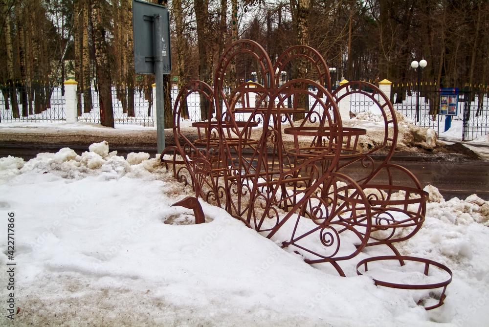 metallic bird figure in the snow