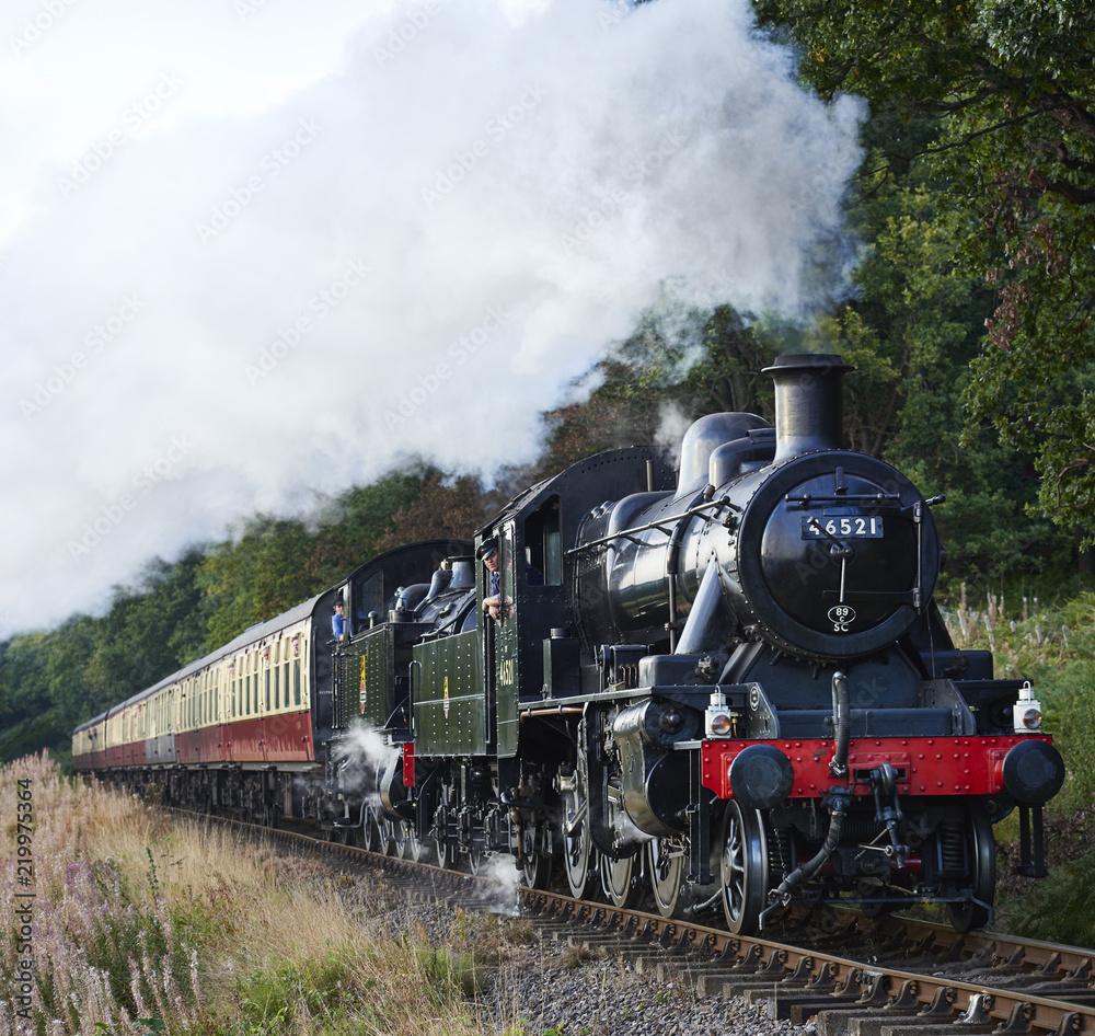 Steam locomotive train express double header 