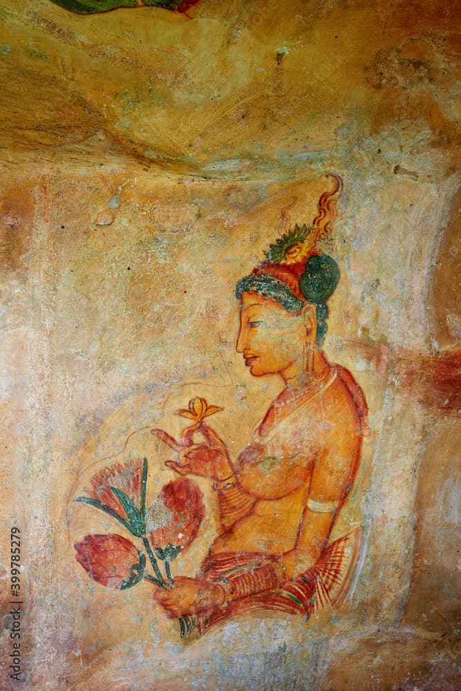 Sigiriya maiden with fruits: one of the 5th century frescoes at the ancient rock fortress of Sigiriya, a UNESCO World Heritage Site in Sri Lanka